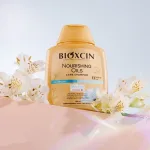 شامپو تقویت کننده و ترمیم کننده بیوکسین مدل Nourishing Oils Care حجم 300 میل